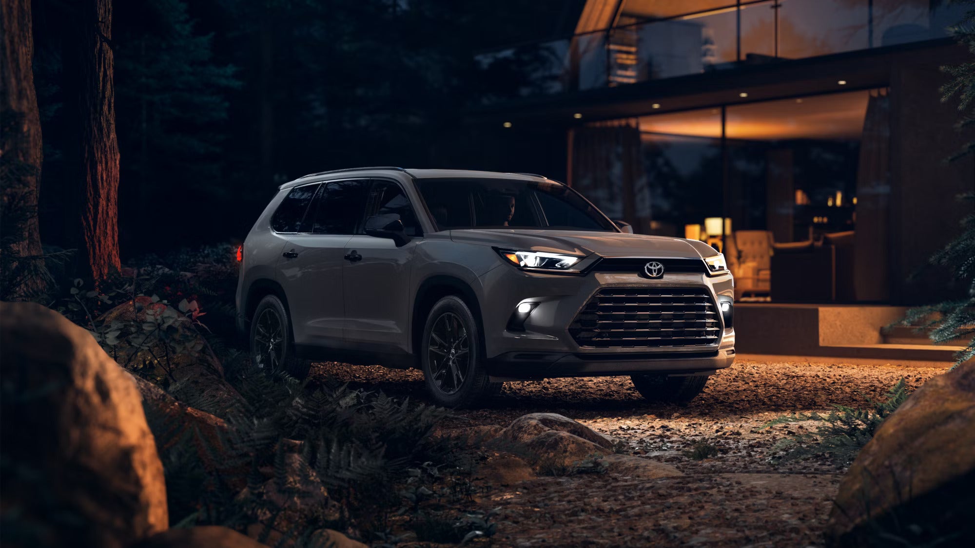 A gray suv sitting parked.