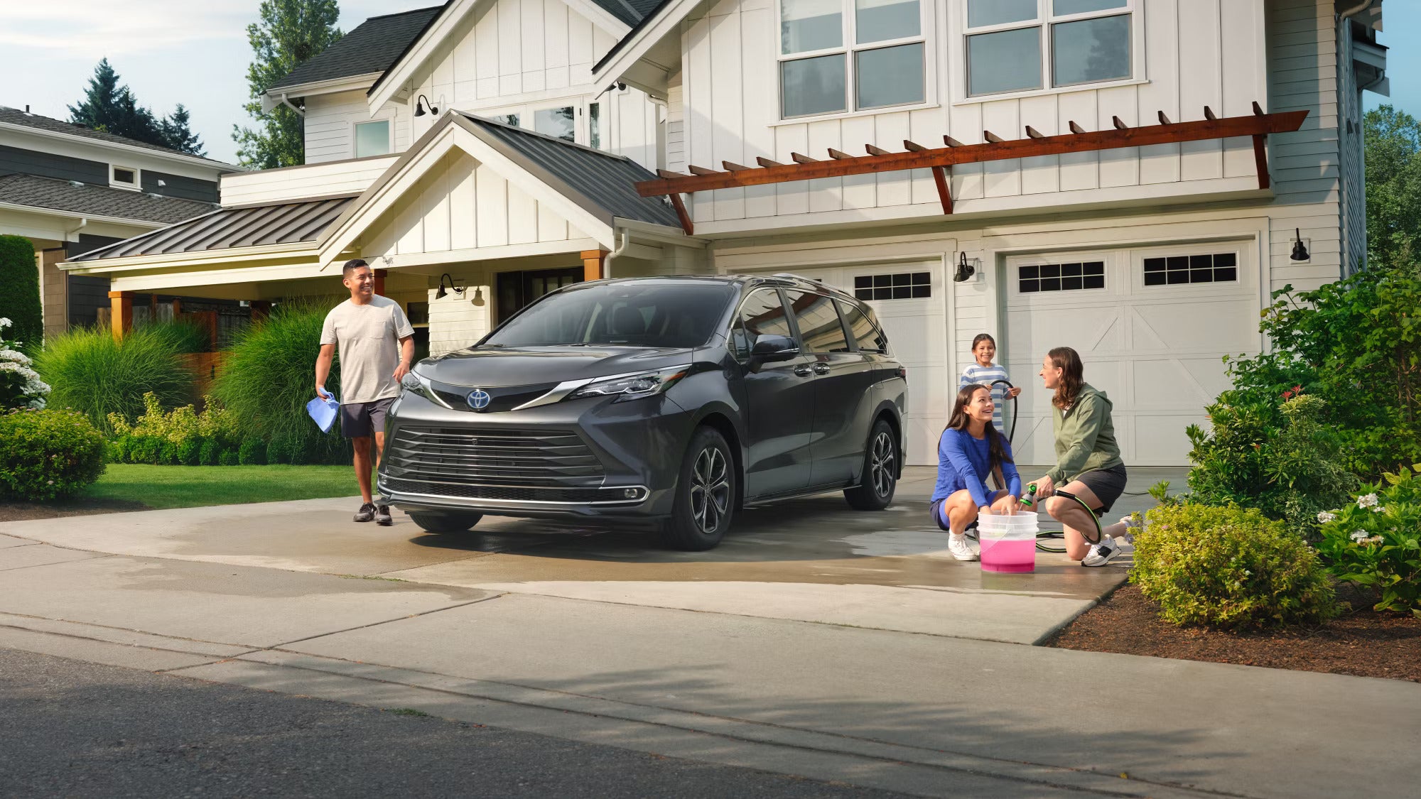 A gray suv parked in a driveway.