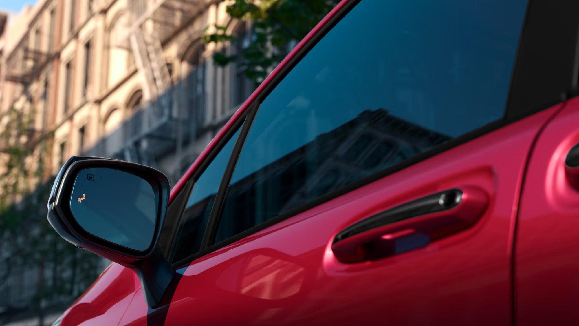 A close look at the driver side of a sienna.