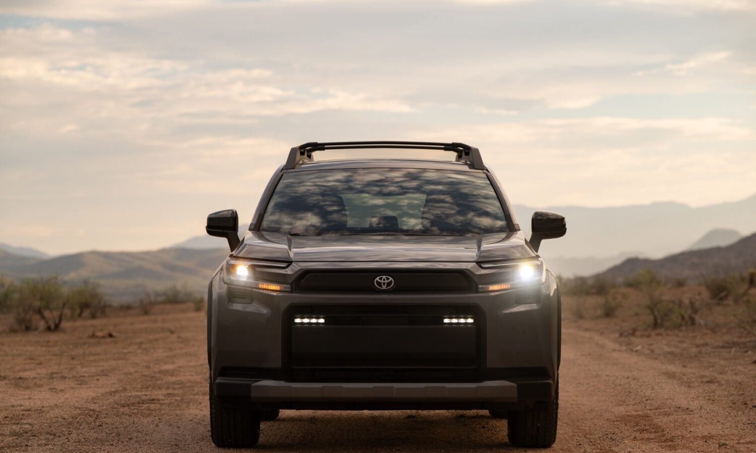 A gray suv sitting parked.