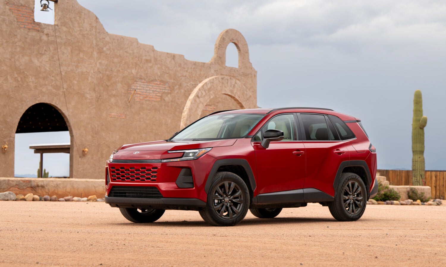 A red car sitting parked.